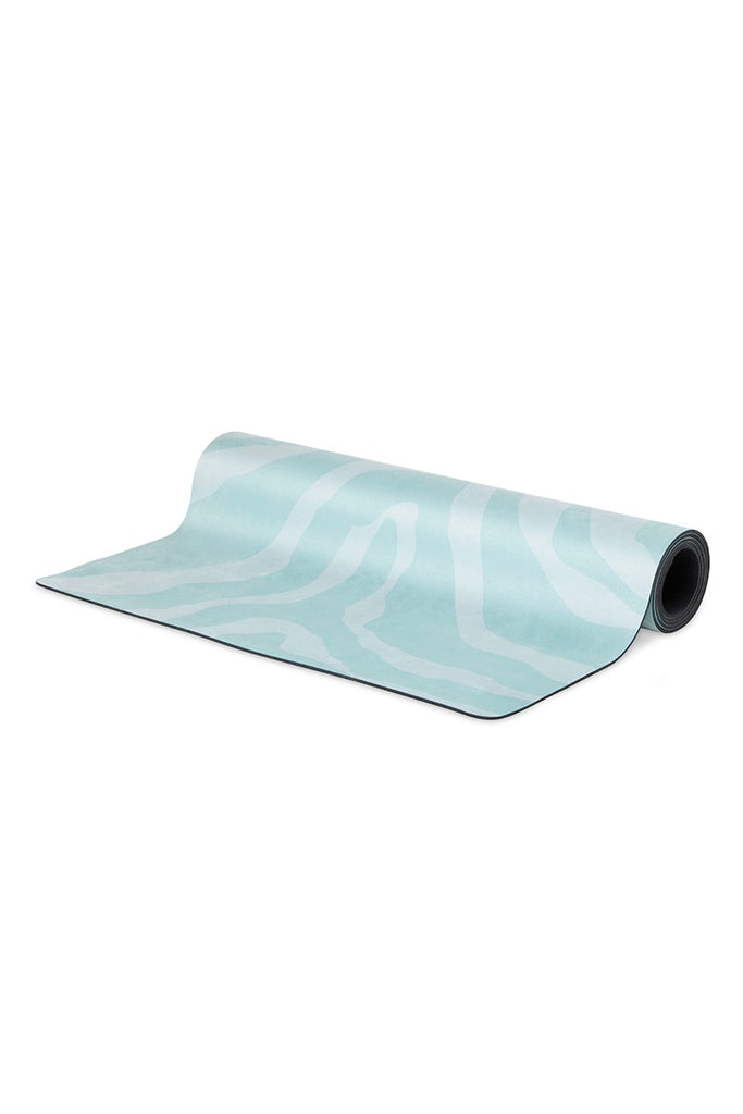 Flatlay mat partly rolled