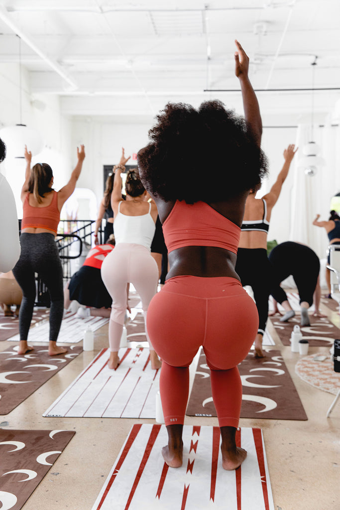 Women stretching during a yoga class