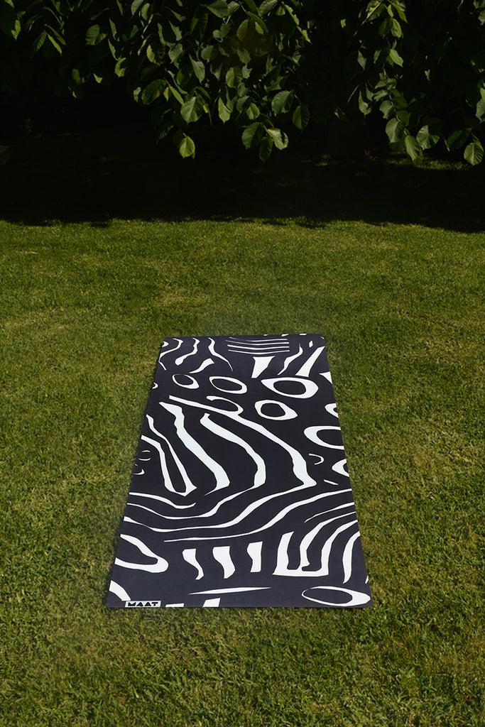 Flat Mat laying one the lawn