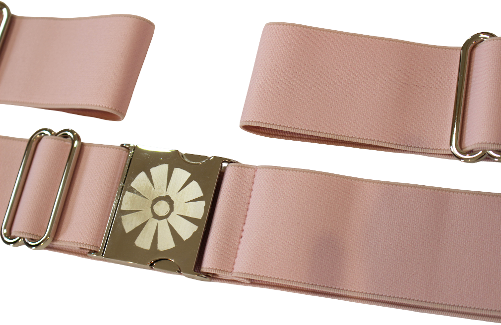 Pink strap with a decorative buckle on a white background