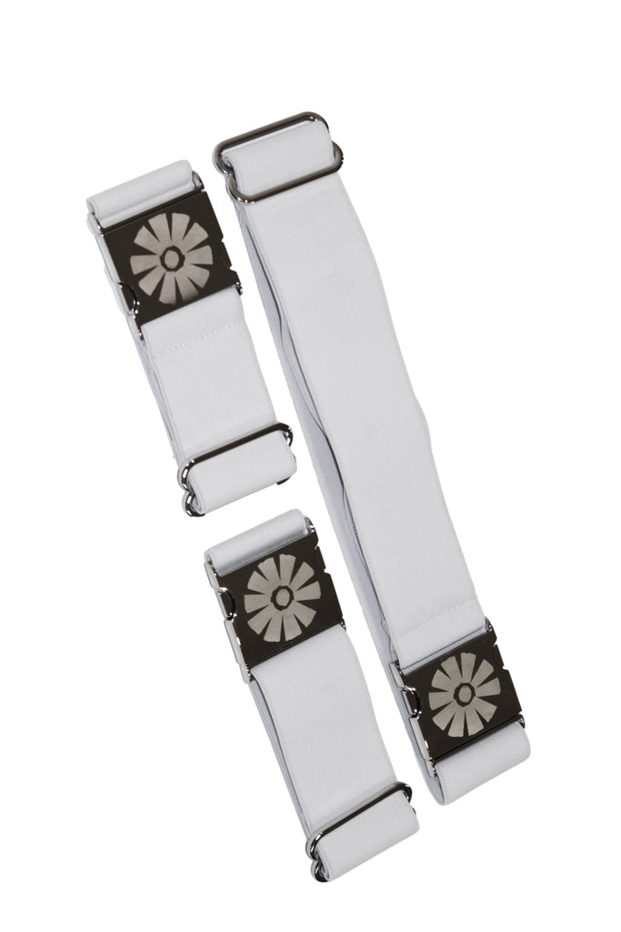 Three white straps with black floral designs on a white background