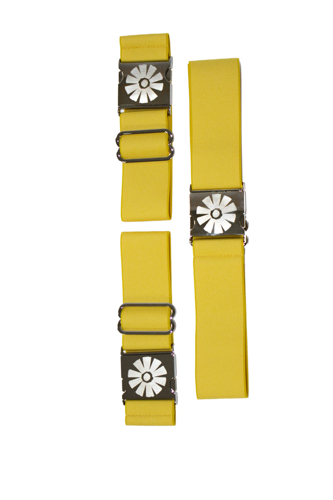 Two yellow straps with metal buckles on a white background