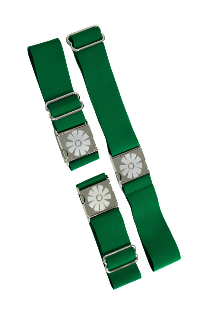 Green straps with silver floral buckles on a white background
