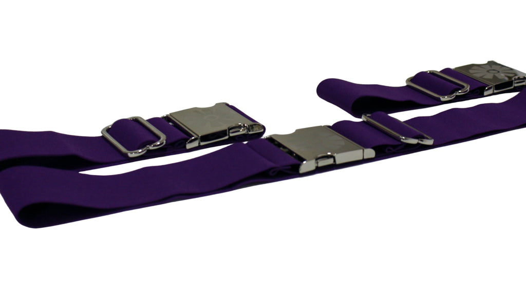 Three purple straps with silver buckles on a white background