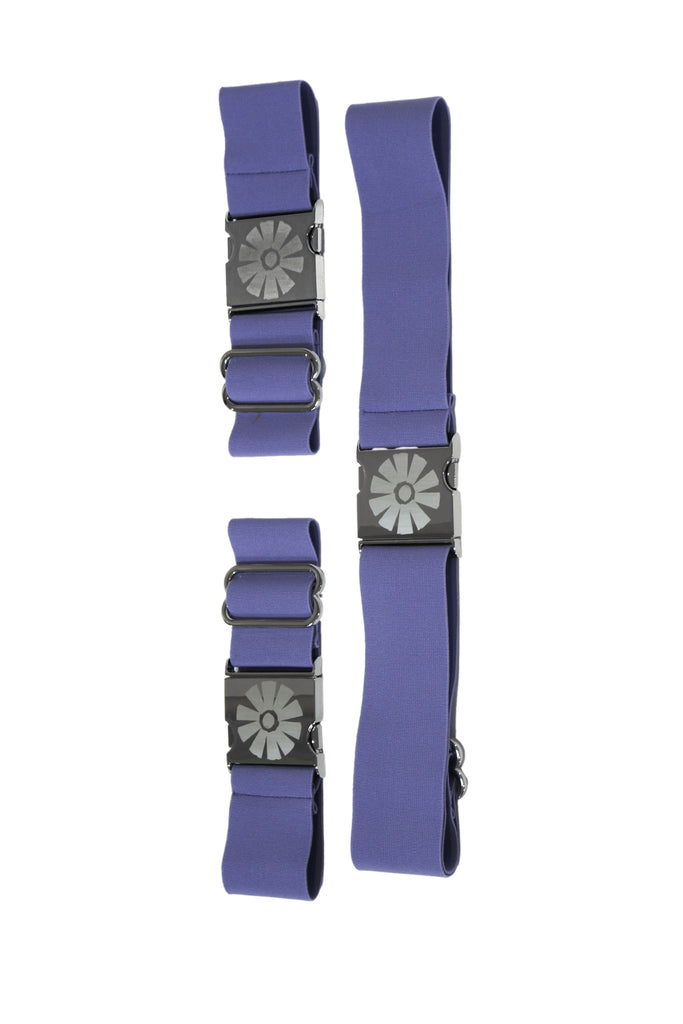 Purple straps with silver floral buckles on a white background