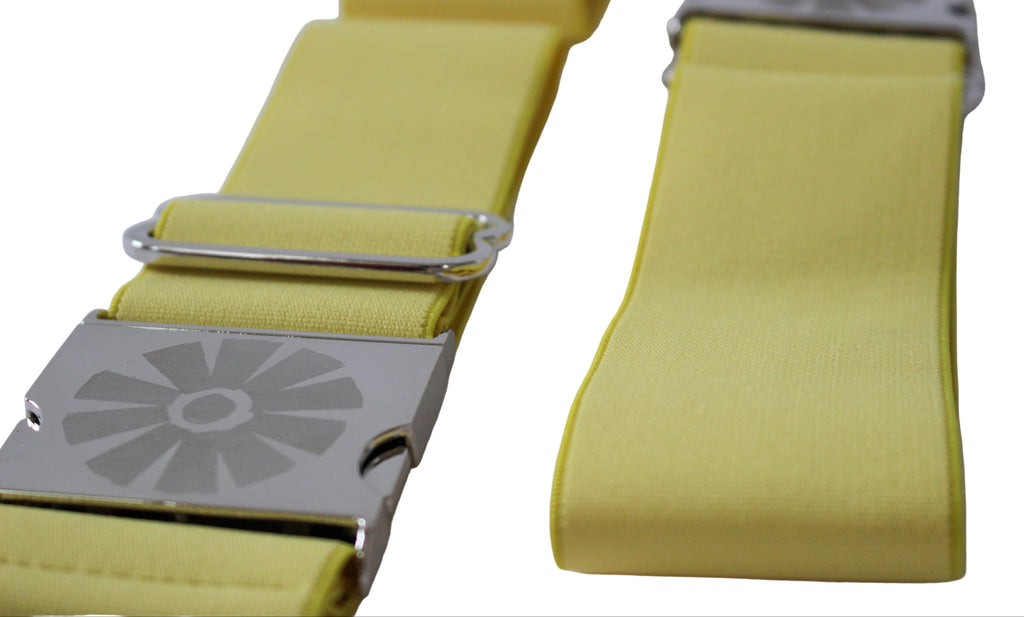 Yellow strap with metal buckle on a white background
