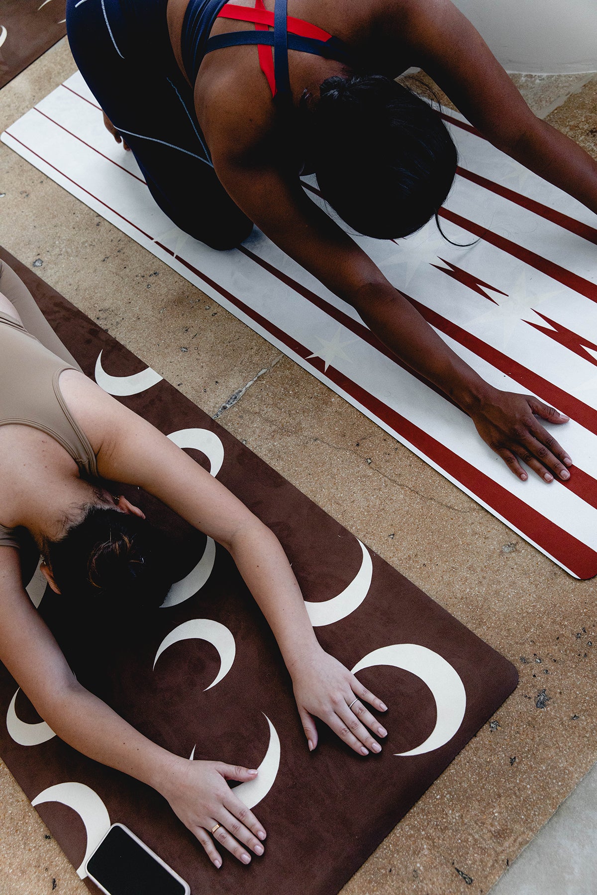 Women stretching on yoga mats